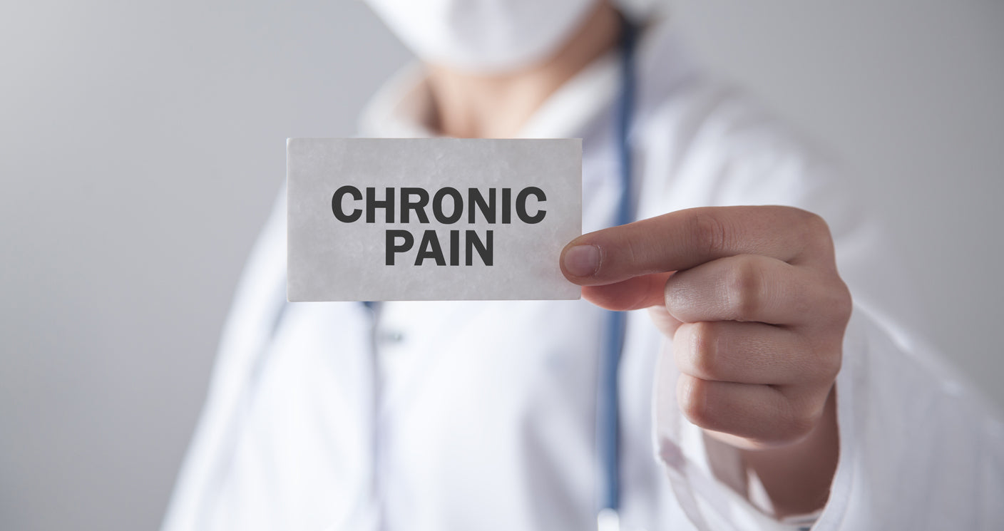 Physician holding chronic pain solutions at PainDocNearMe